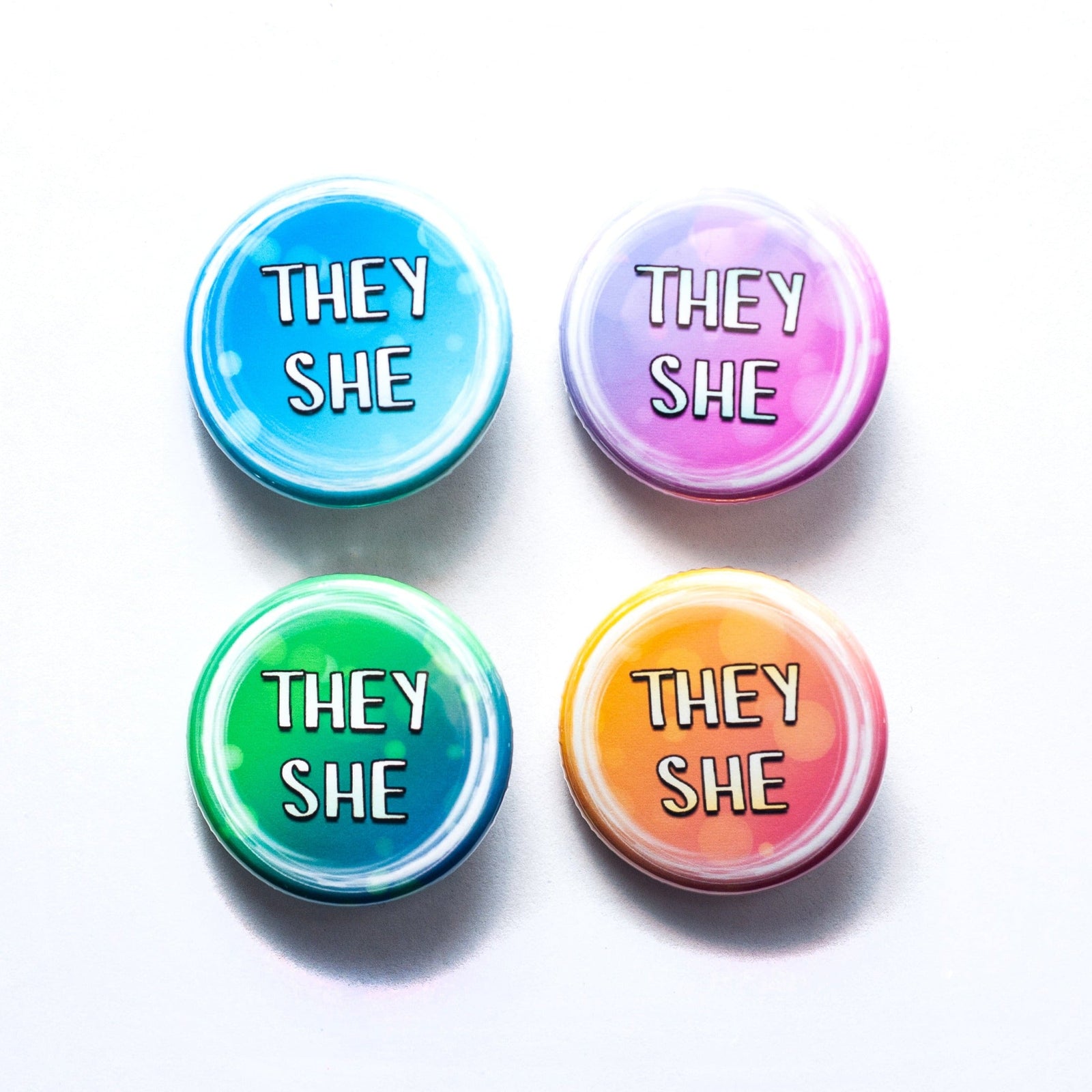 They/she pronoun buttons
